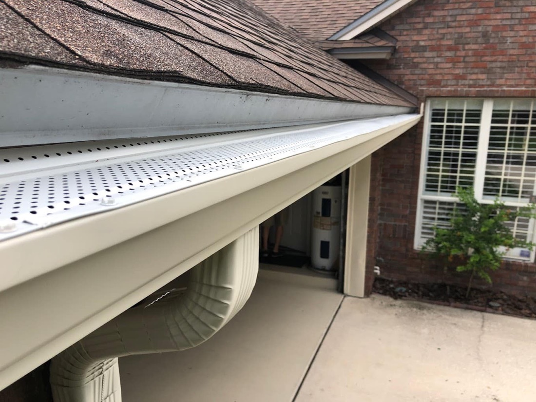 Stainless-steel gutter guards installed on a Nocatee home