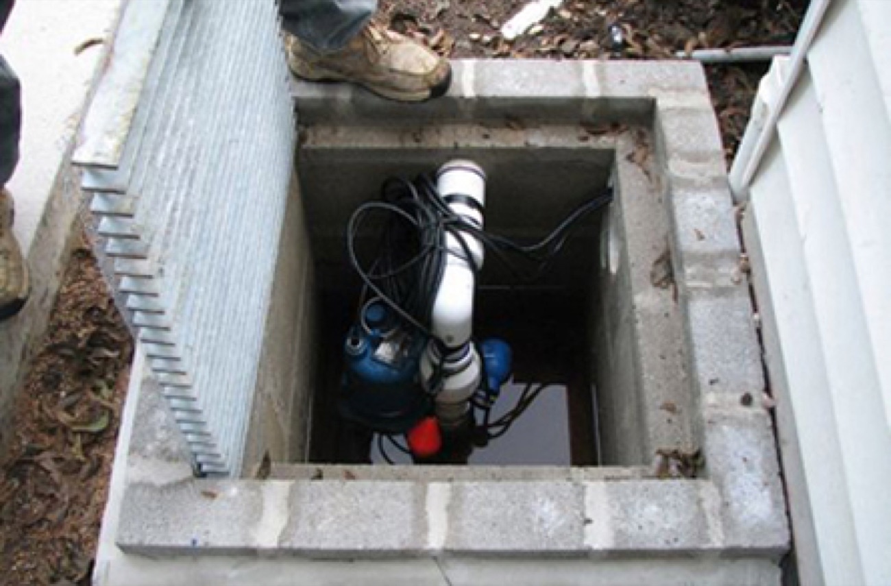 Sump pump system moving groundwater off a low-lying Florida lot